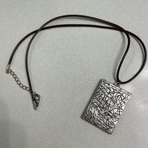 Reversible pendant necklace with braid rope chain. Pink /peach or silver sides